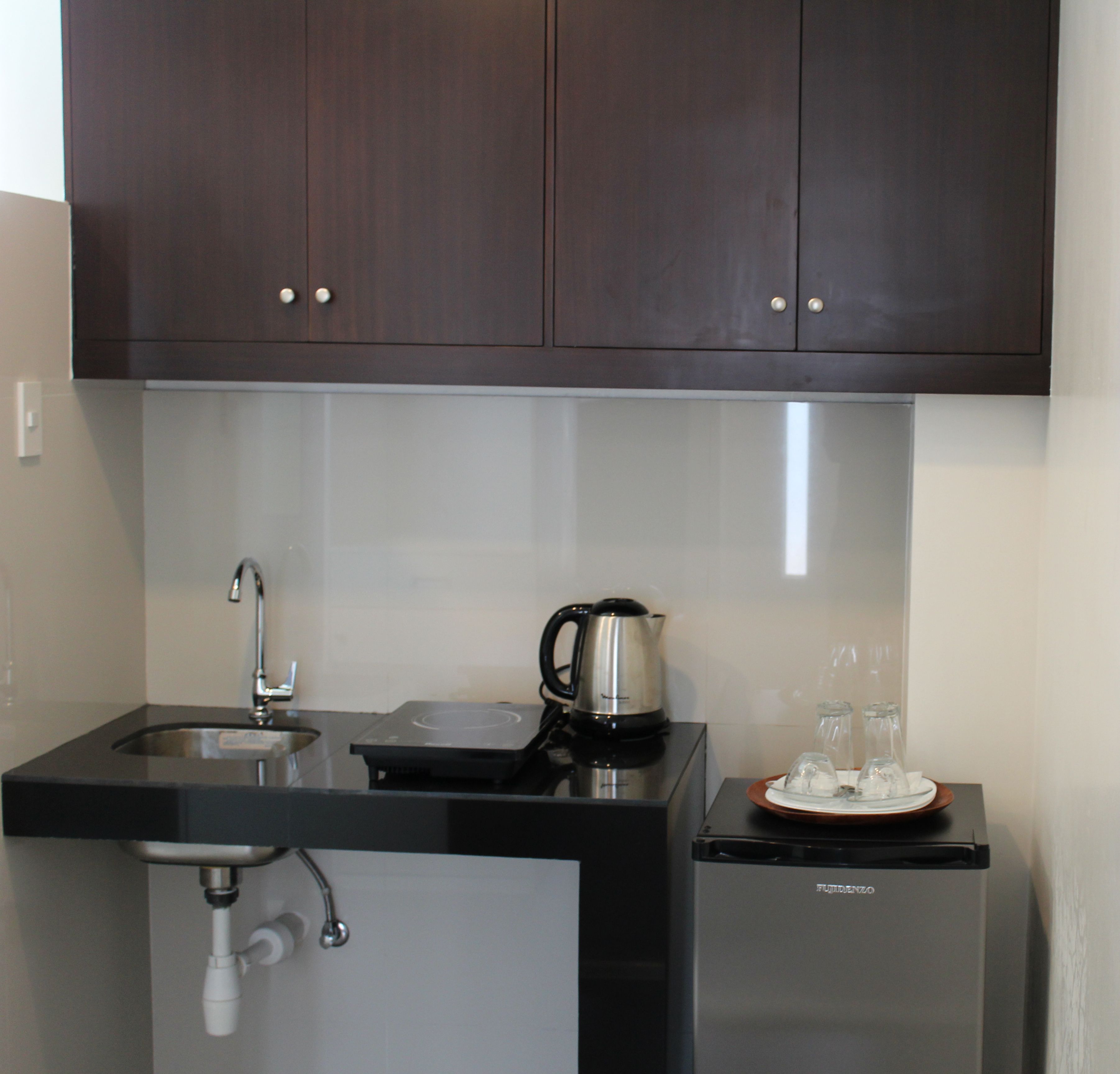 deluxe studio, 1 queen bed | private kitchenette | coffee/tea maker, electric kettle