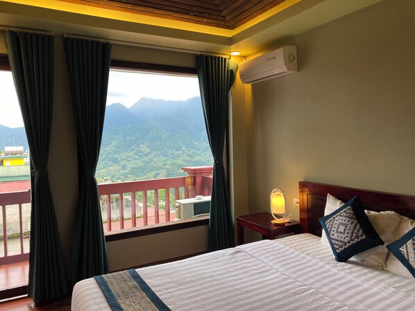 Deluxe Double Room | Minibar, individually furnished, desk, laptop workspace - Botanic Sapa (Sa Pa)