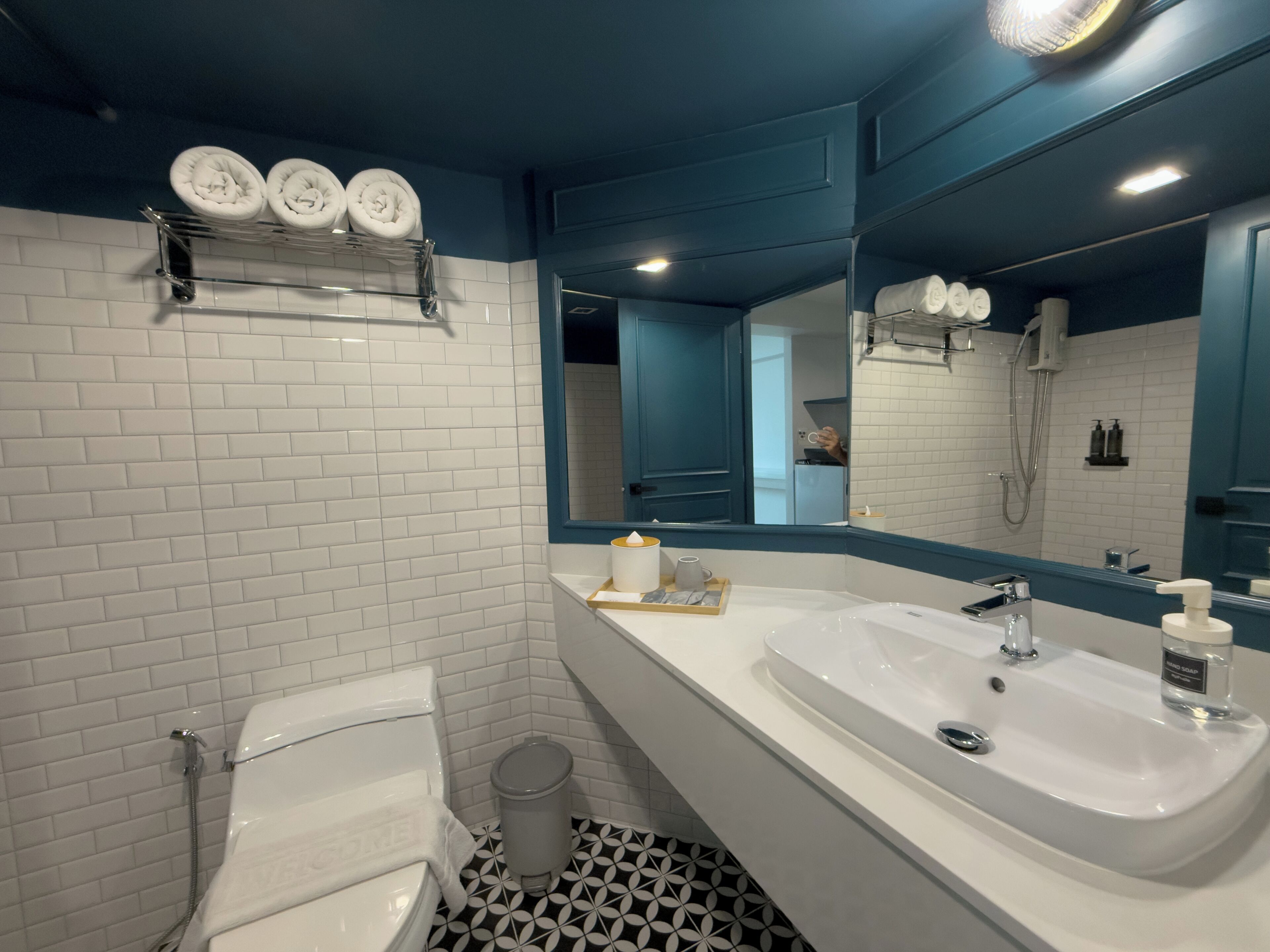 deluxe triple room | bathroom | shower, free toiletries, hair dryer, towels