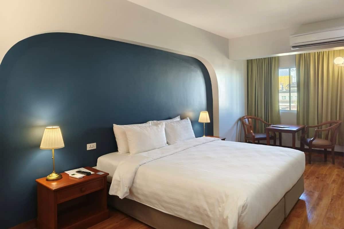 Standaard tweepersoonskamer | Een minibar, verduisterende gordijnen, gratis wifi, beddengoed