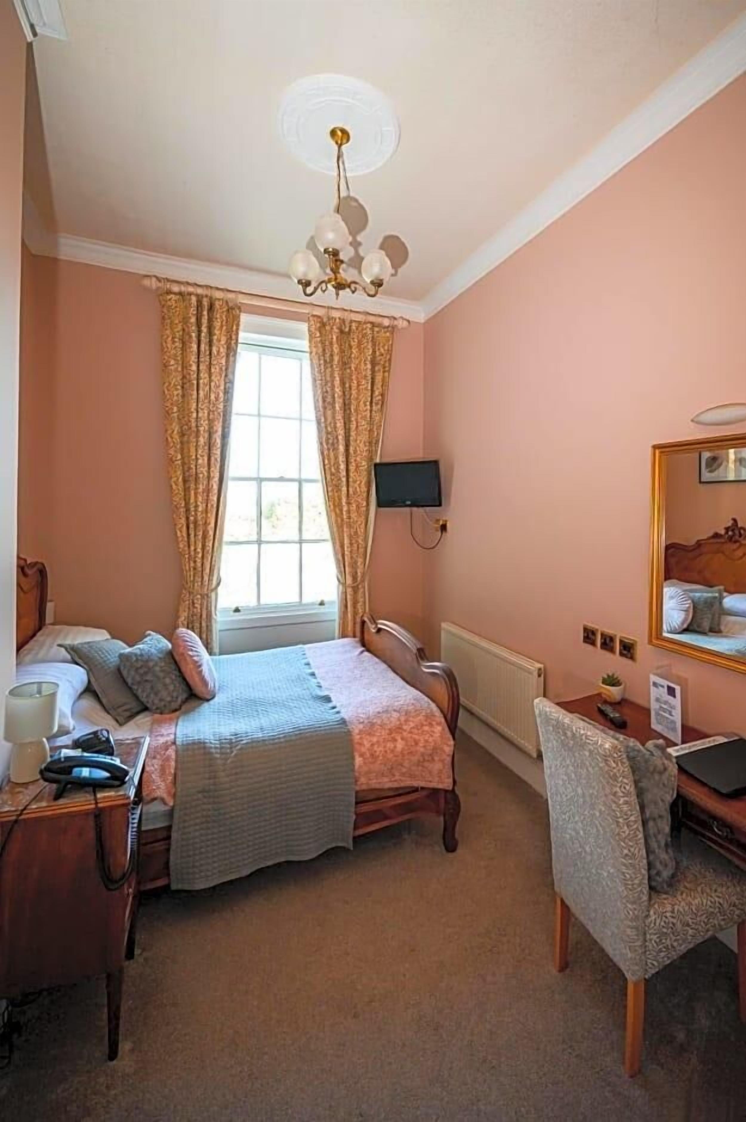 Desk, blackout drapes, iron/ironing board, free WiFi