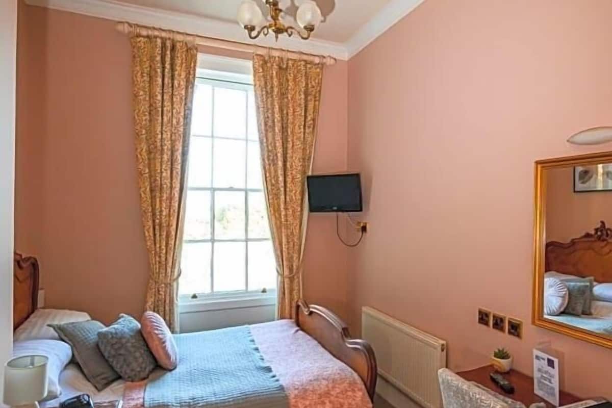 Desk, blackout drapes, iron/ironing board, WiFi (free)