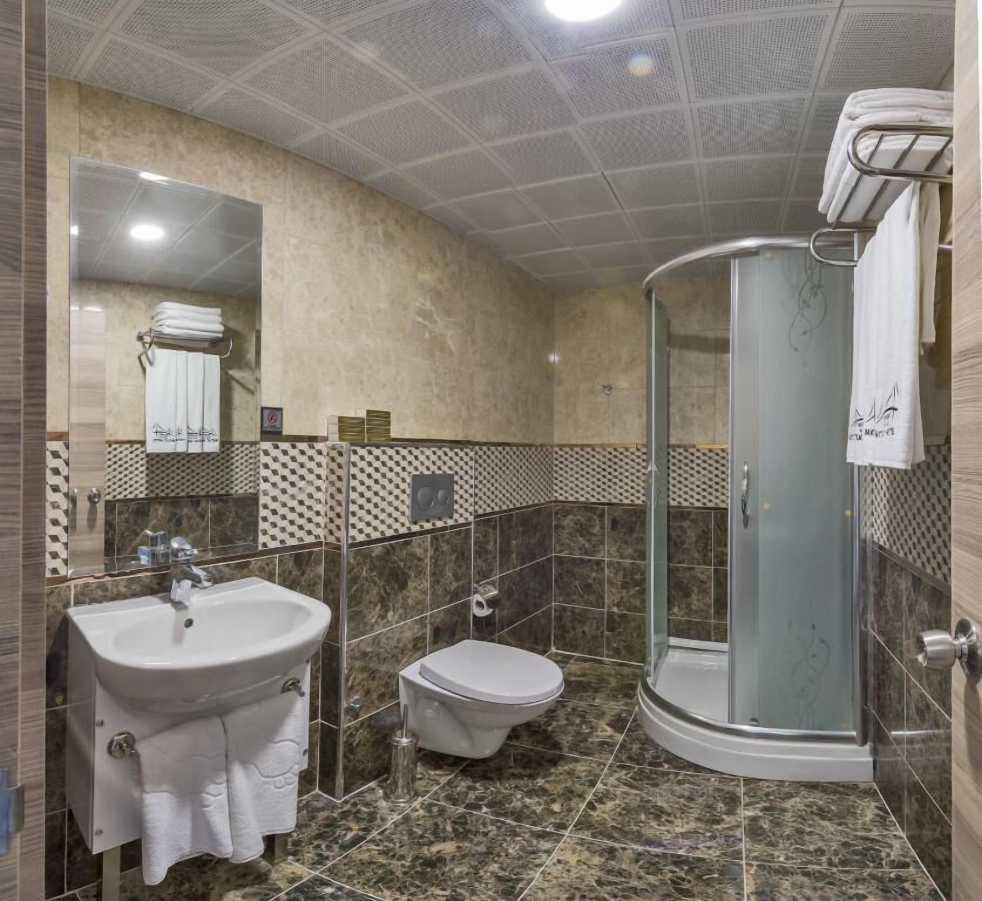 Shower, free toiletries, hair dryer, towels