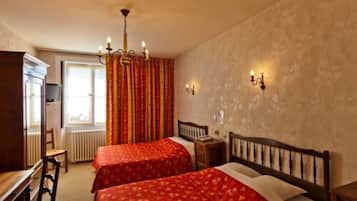 Coffres-forts dans les chambres, bureau, draps fournis