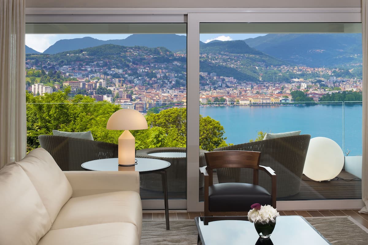 premium suite, 1 king bed with sofa bed, terrace, lake view | 1 bedroom, premium bedding, down duvets, select comfort beds