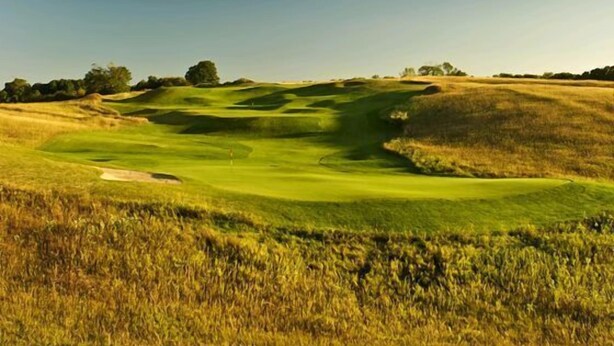 A golf course with rolling green hills and a clear sky. - Dunmaglas Golf Course (Charlevoix)