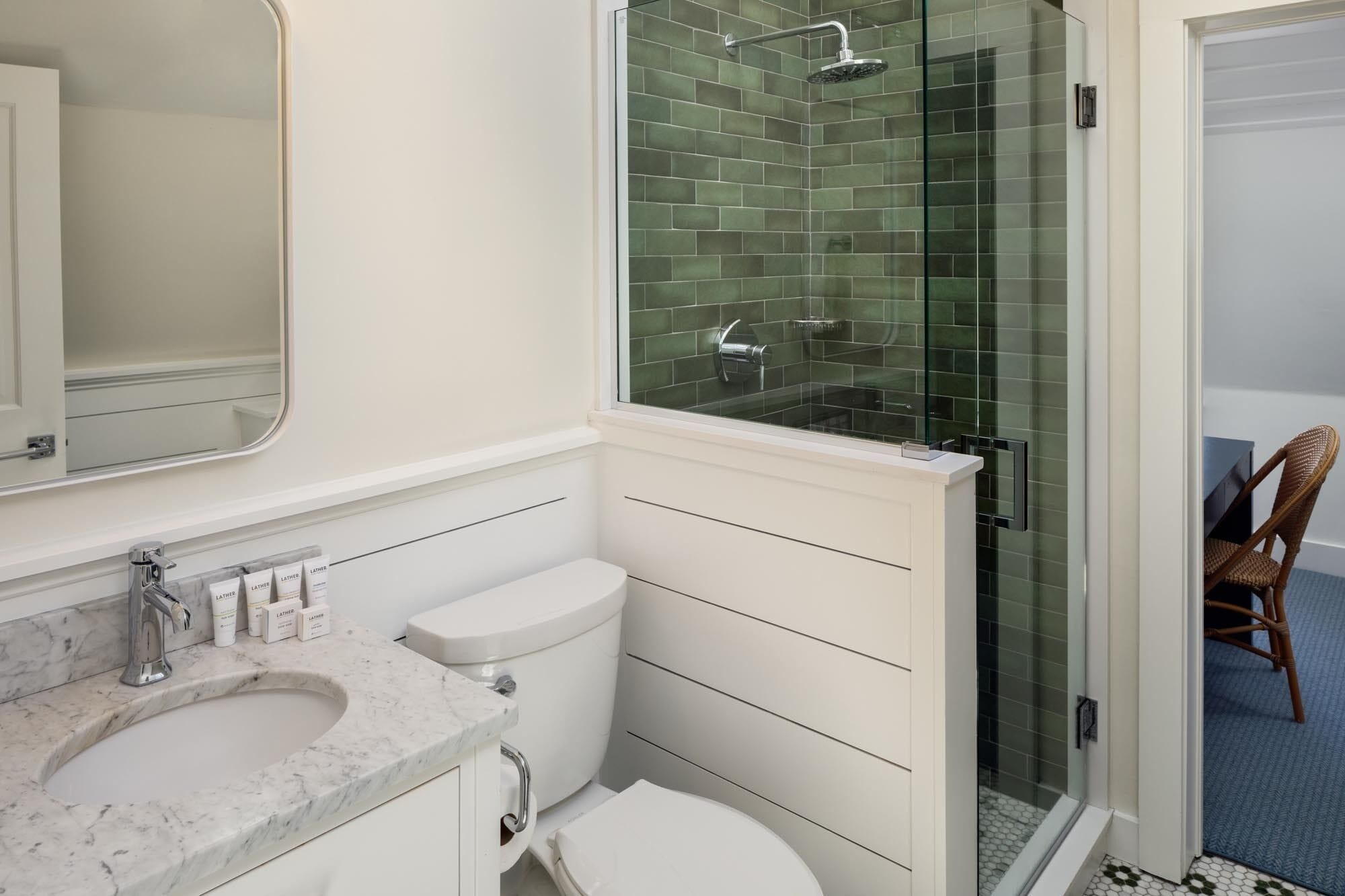 designer toiletries, hair dryer, bathrobes, towels