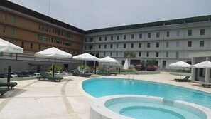 Outdoor pool, pool umbrellas, pool loungers