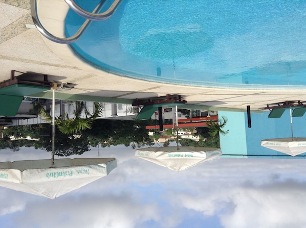 Outdoor pool, pool umbrellas, pool loungers
