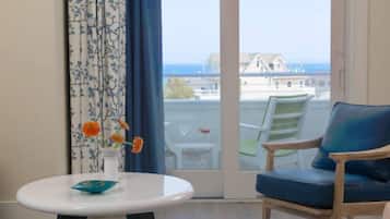 Ocean Suite with Balcony | Living area | TV, fireplace, tablet, iPod dock