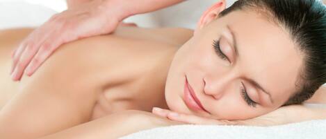 A person receiving a back massage.