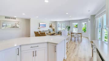Luxury Townhome | Living area | 32-inch flat-screen TV with cable channels, TV