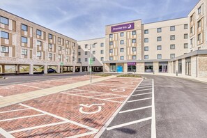 A Premier Inn hotel with a parking lot, marked spaces, and a wheelchair-accessible area. - Premier Inn Bristol Cribbs Causeway - M5 J17 (Bristol)