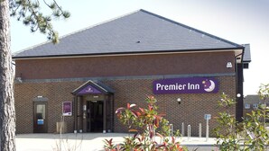 A brick building with a sign reading 'Premier Inn.' - Premier Inn Littlehampton (Littlehampton)