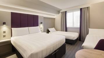 Habitación cuádruple familiar | Ropa de cama