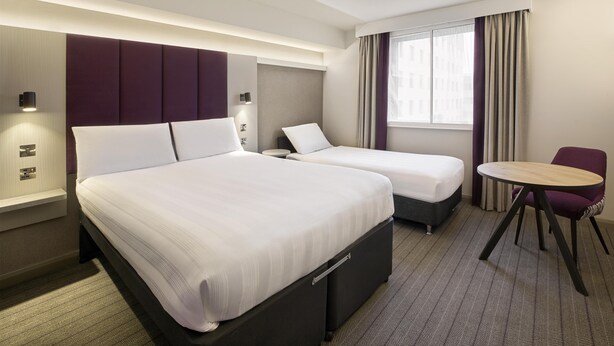 Family Triple Room | Bed sheets