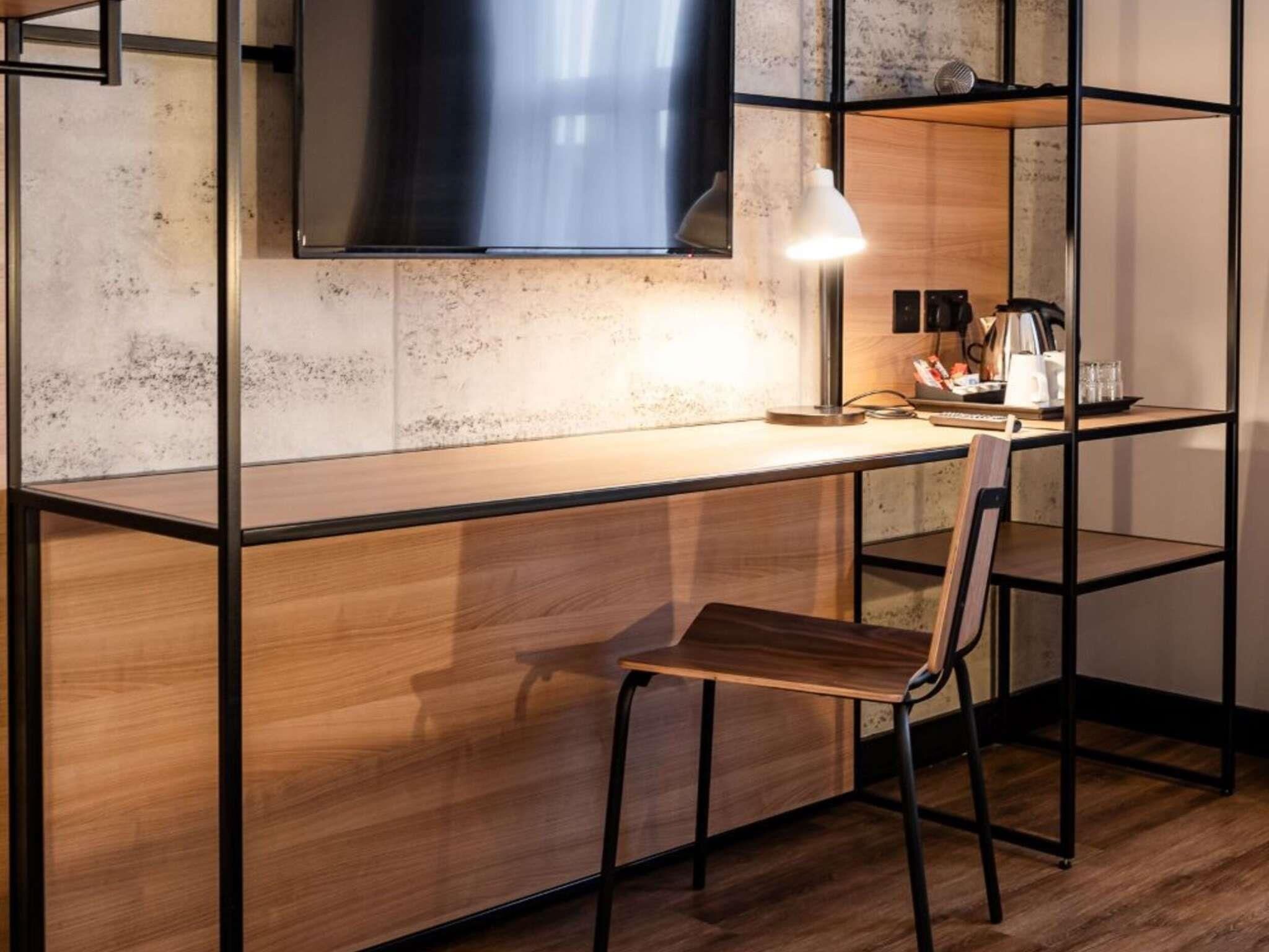 Desk, laptop workspace, free WiFi, bed sheets