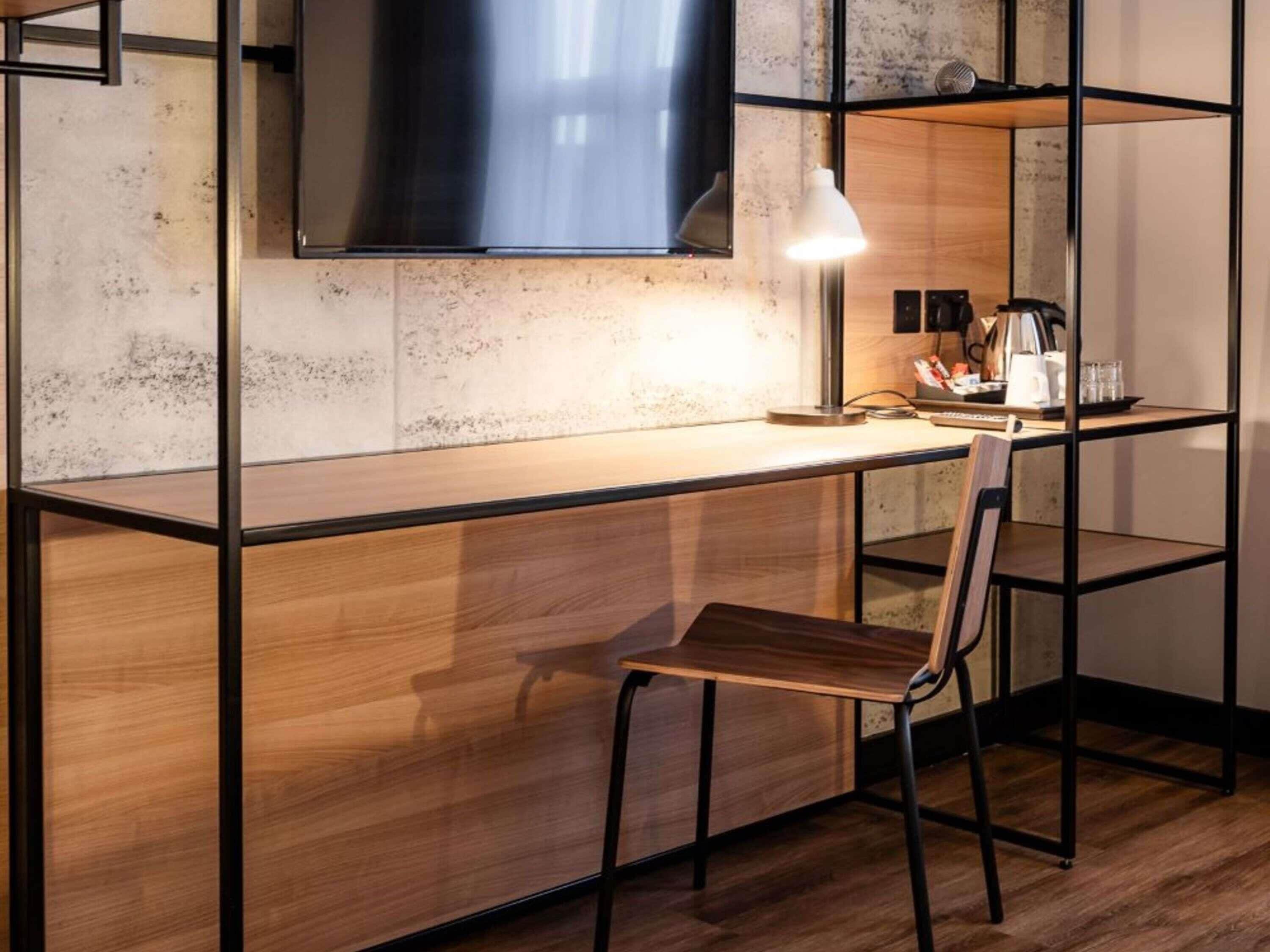 Desk, laptop workspace, free WiFi, bed sheets
