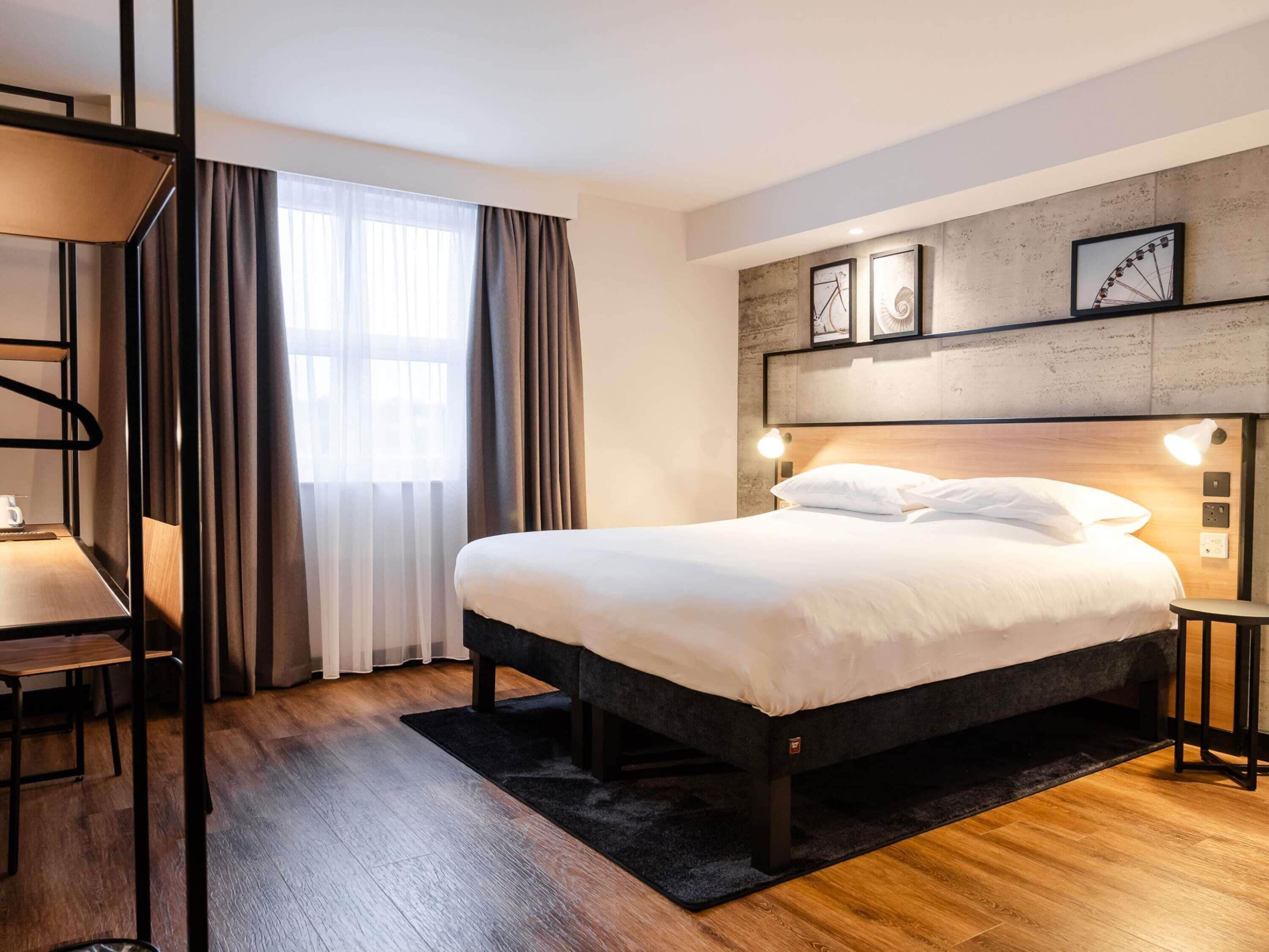 Twin Room, 2 Single Beds (Accessible) | Desk, laptop workspace, free WiFi, bed sheets