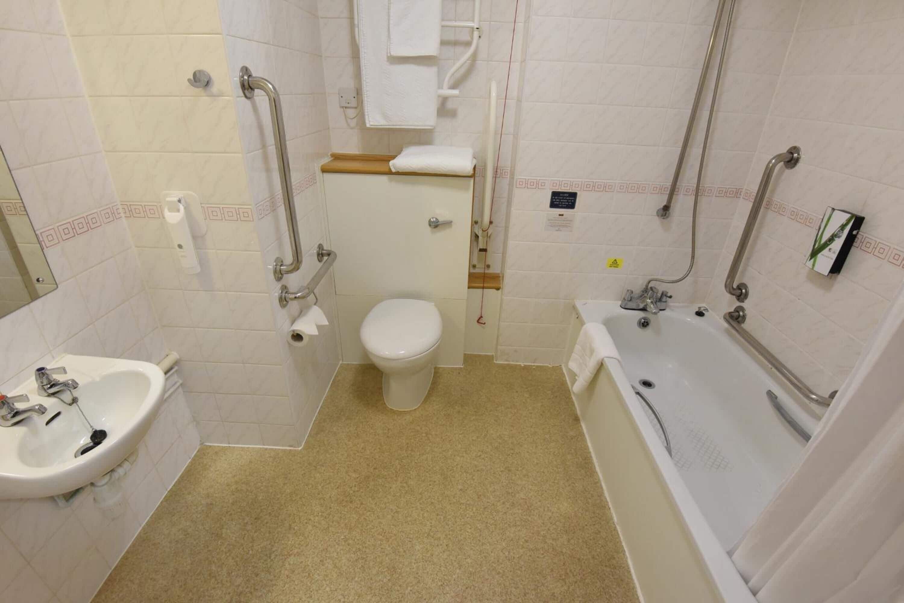 combined shower/bathtub, free toiletries, hair dryer, towels
