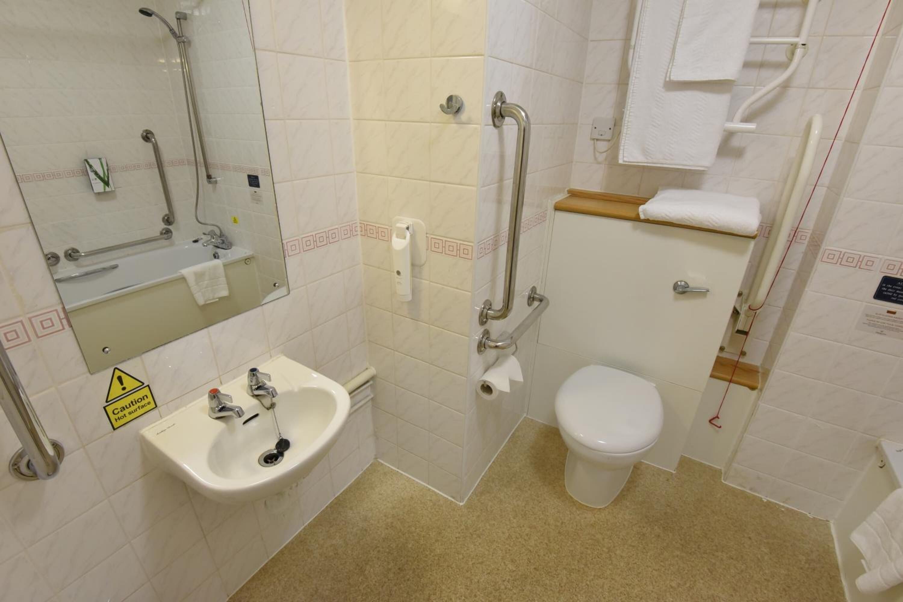 combined shower/bathtub, free toiletries, hair dryer, towels