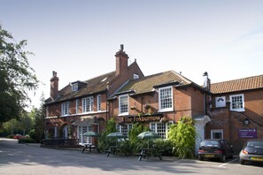 A traditional brick building with a sign reading 'The Foxburrow.' - Premier Inn Lowestoft (Lowestoft)