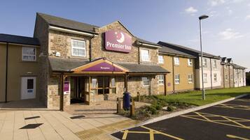 Welcome to Premier Inn Hotel, featuring a traditional entrance and reception area.