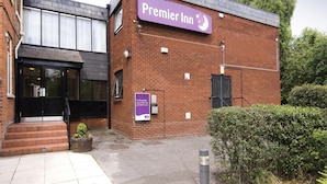 A brick building with a sign for Premier Inn. - Premier Inn Northwich South (Northwich)