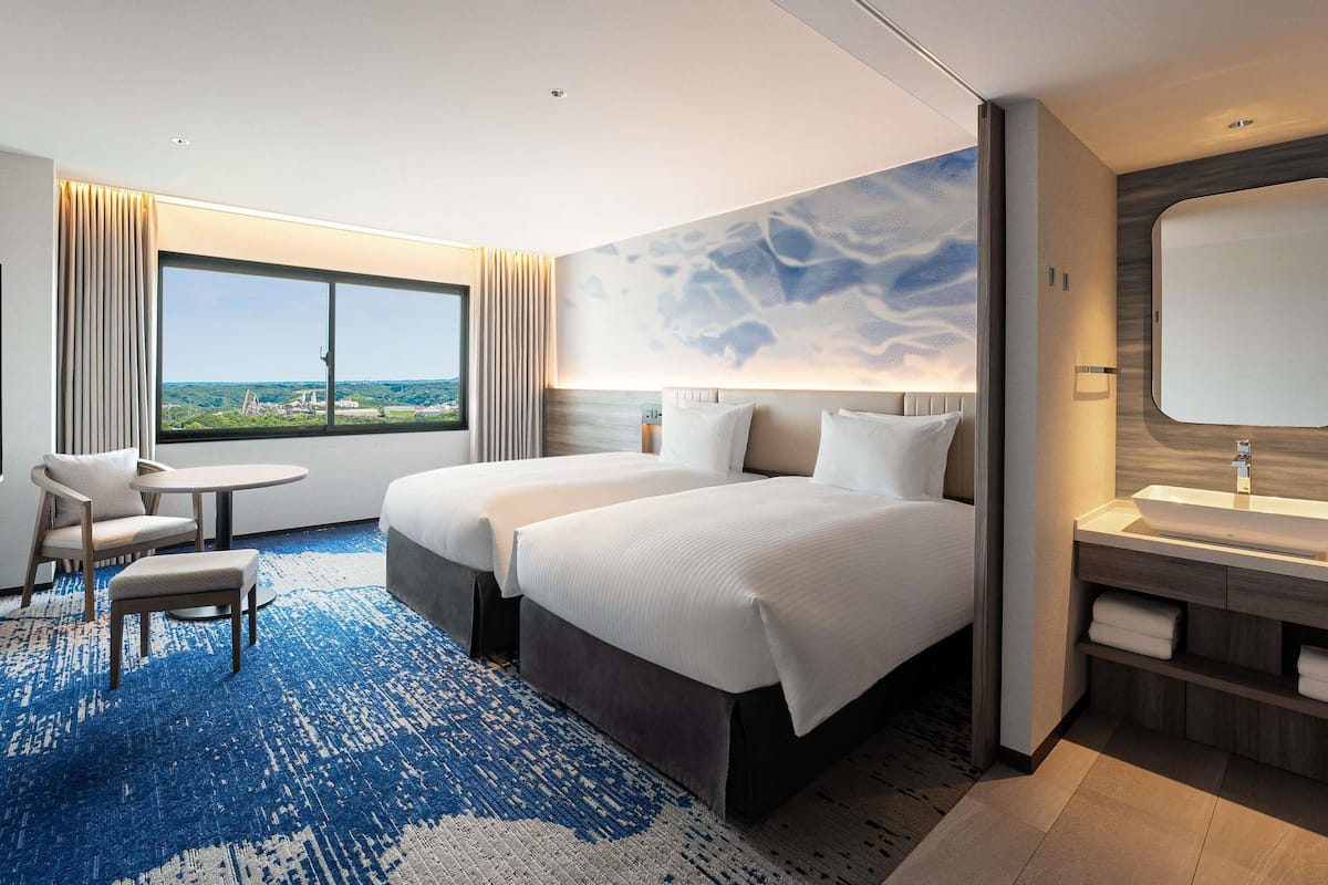 Habitación superior, varias camas, vistas a la montaña | Caja fuerte, cortinas opacas, wifi gratis y ropa de cama