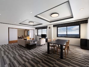 Deluxe Suite, Multiple Beds, Sea View | In-room safe, blackout curtains, free WiFi, bed sheets