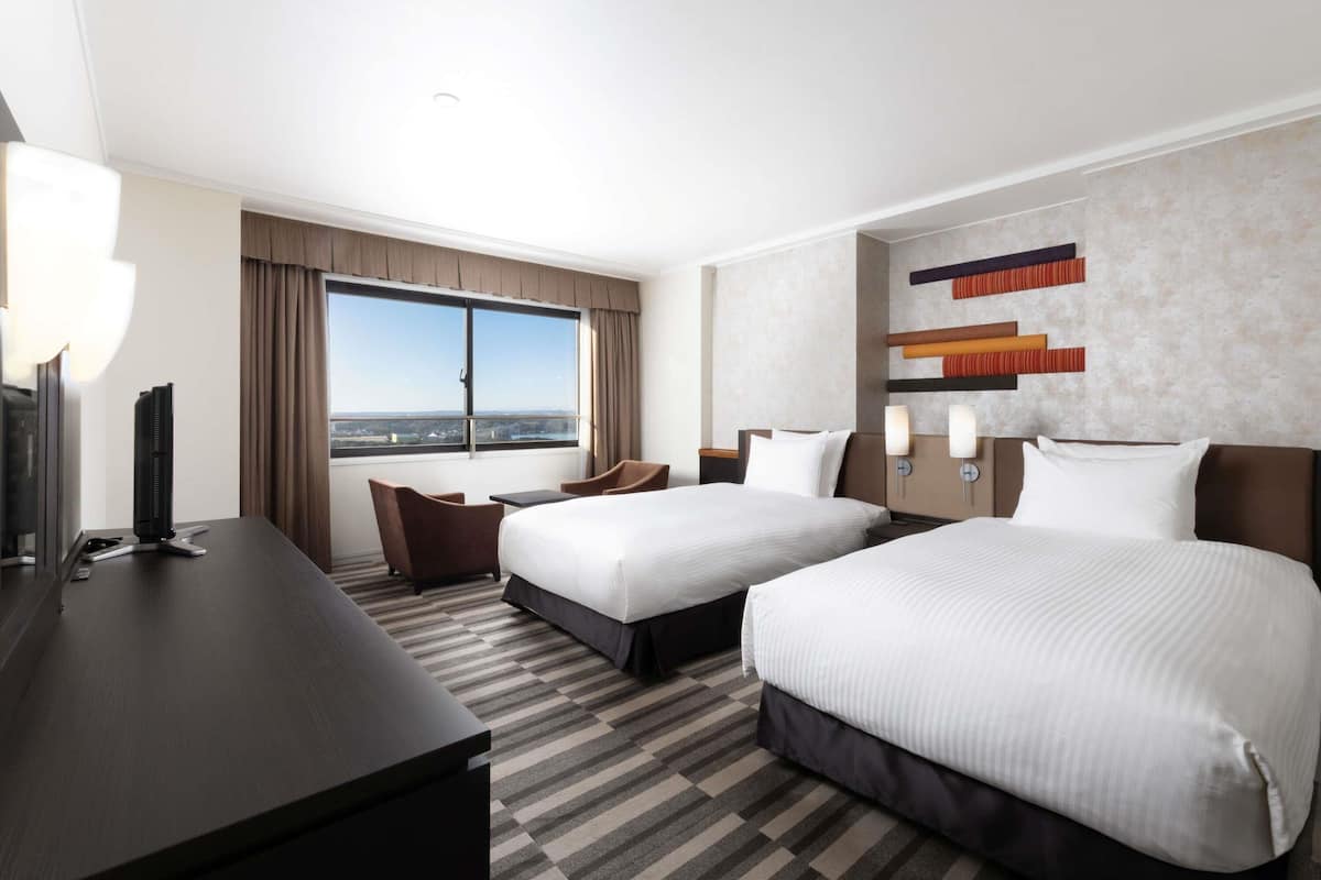 Deluxe Suite, Multiple Beds, Sea View | In-room safe, blackout curtains, free WiFi, bed sheets