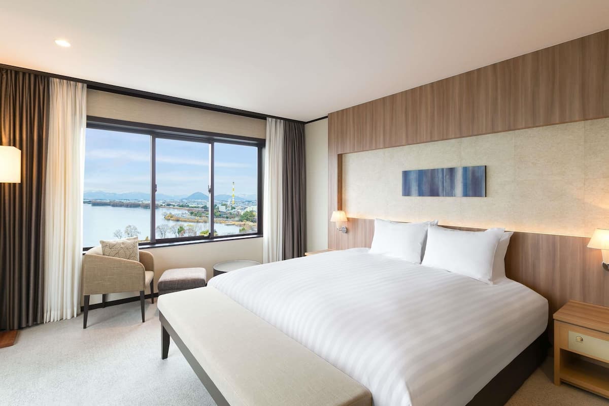 Deluxe Suite, Multiple Beds, Lake View | Premium bedding, in-room safe, desk, iron/ironing board