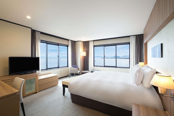 Deluxe Suite, Multiple Beds, Lake View | Premium bedding, in-room safe, desk, iron/ironing board