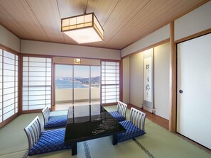 Deluxe Suite, Multiple Beds, Sea View | Desk, iron/ironing board, bed sheets