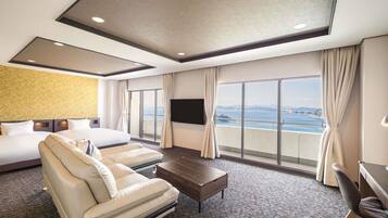 Desk, iron/ironing board, bed sheets