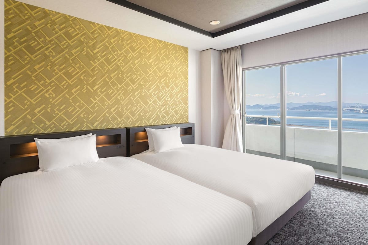 Classic Suite, Multiple Beds, Sea View | Desk, iron/ironing board, bed sheets