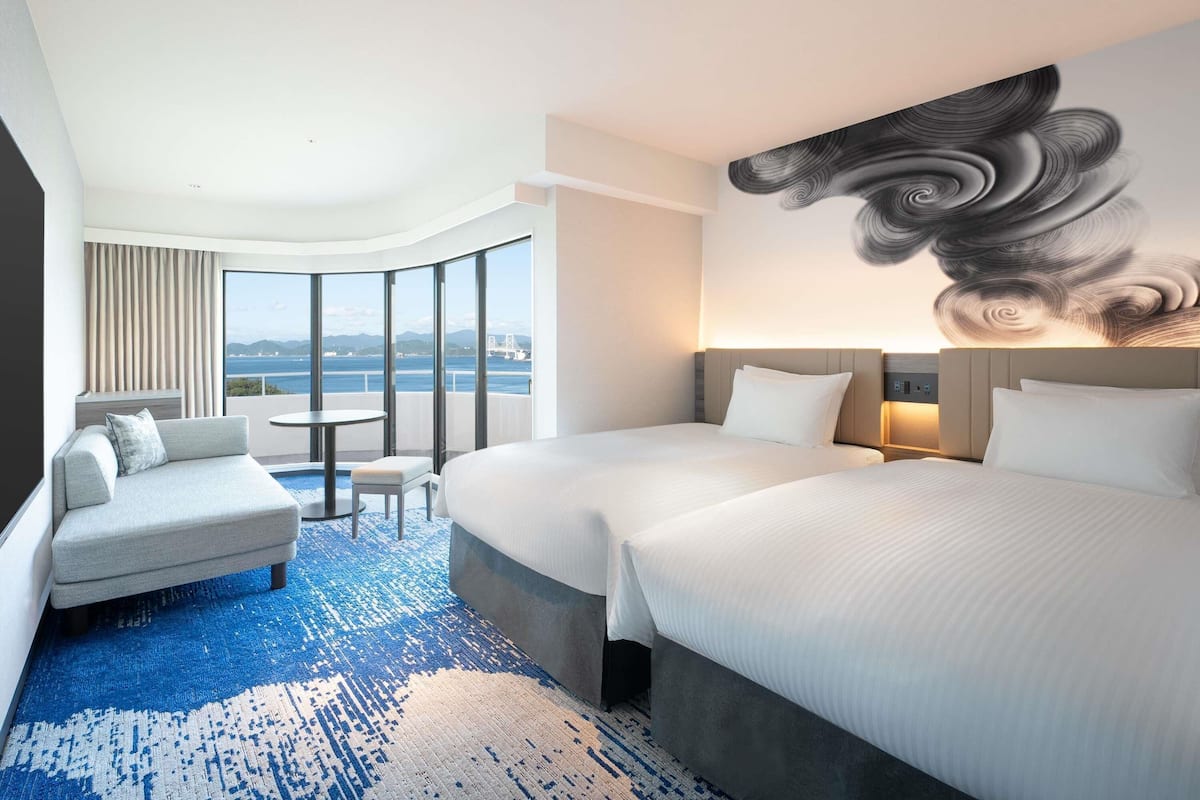 Classic Room, 2 Twin Beds, Sea View (Corner) | Desk, iron/ironing board, bed sheets