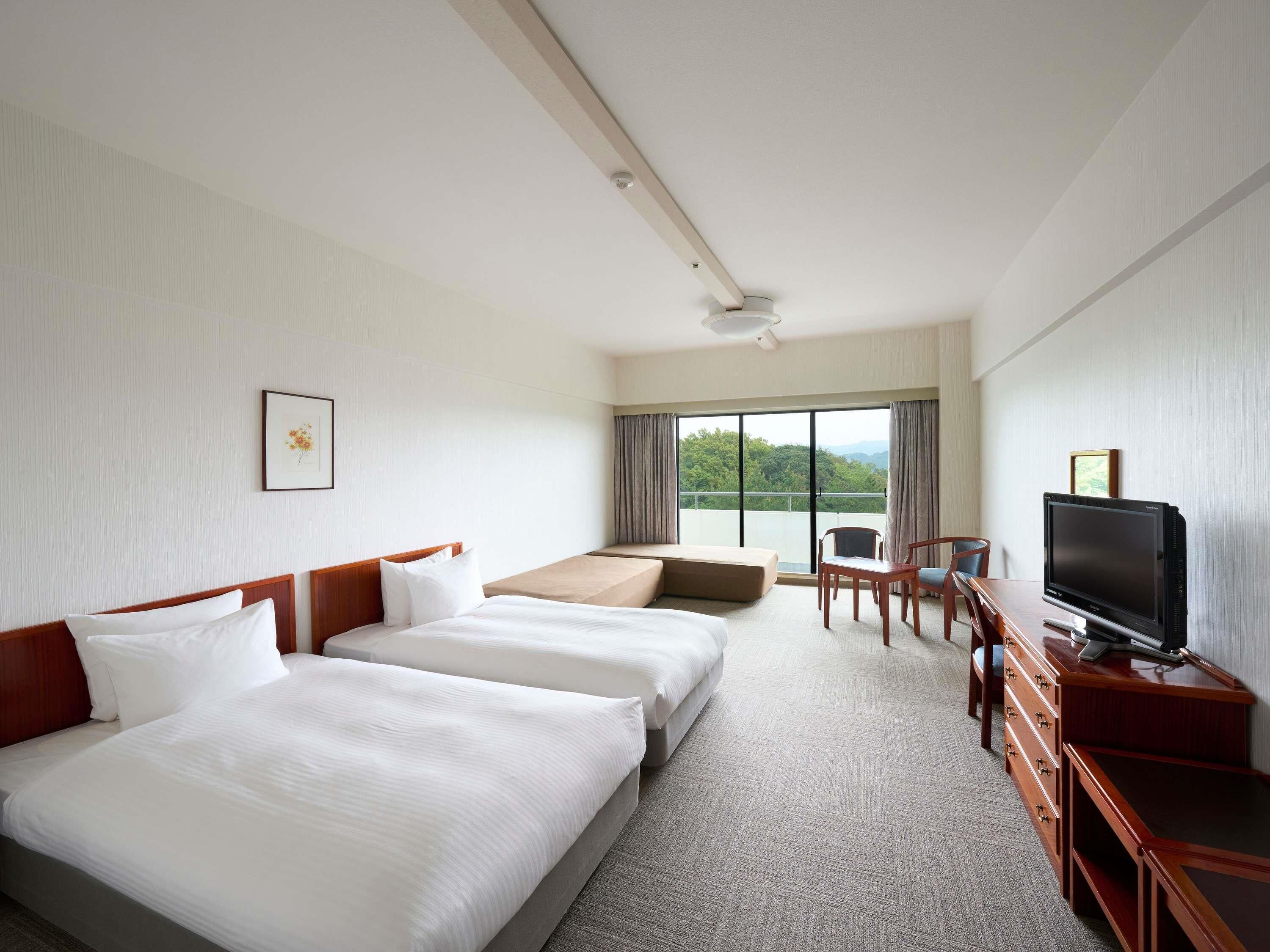 Classic Room with 2 single beds and 1 extra bed, Mountain view | Desk, iron/ironing board, bed sheets