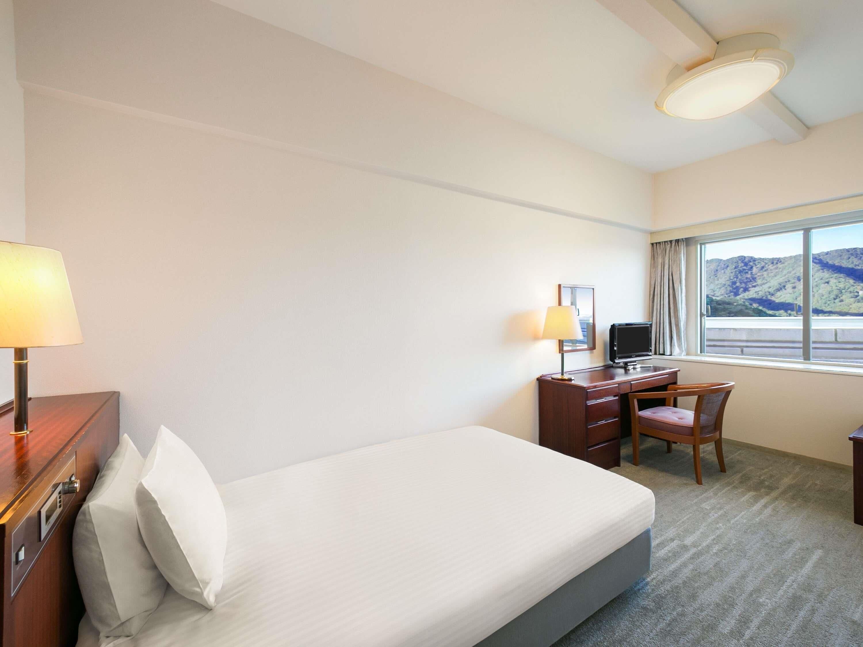 Classic Room with 1 single bed | Desk, iron/ironing board, bed sheets