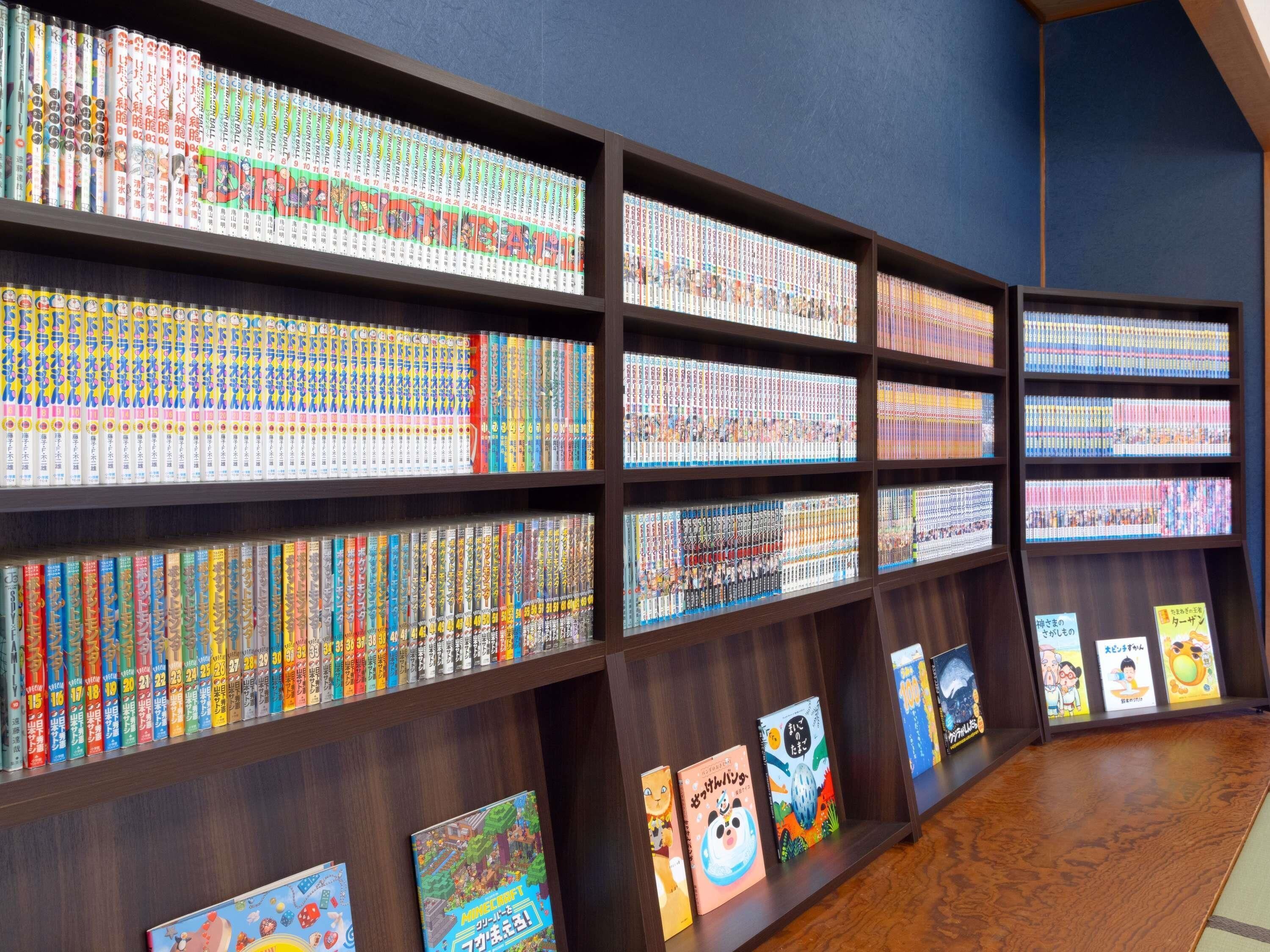 A library with shelves of manga and books.