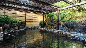 Desk, iron/ironing board, bed sheets