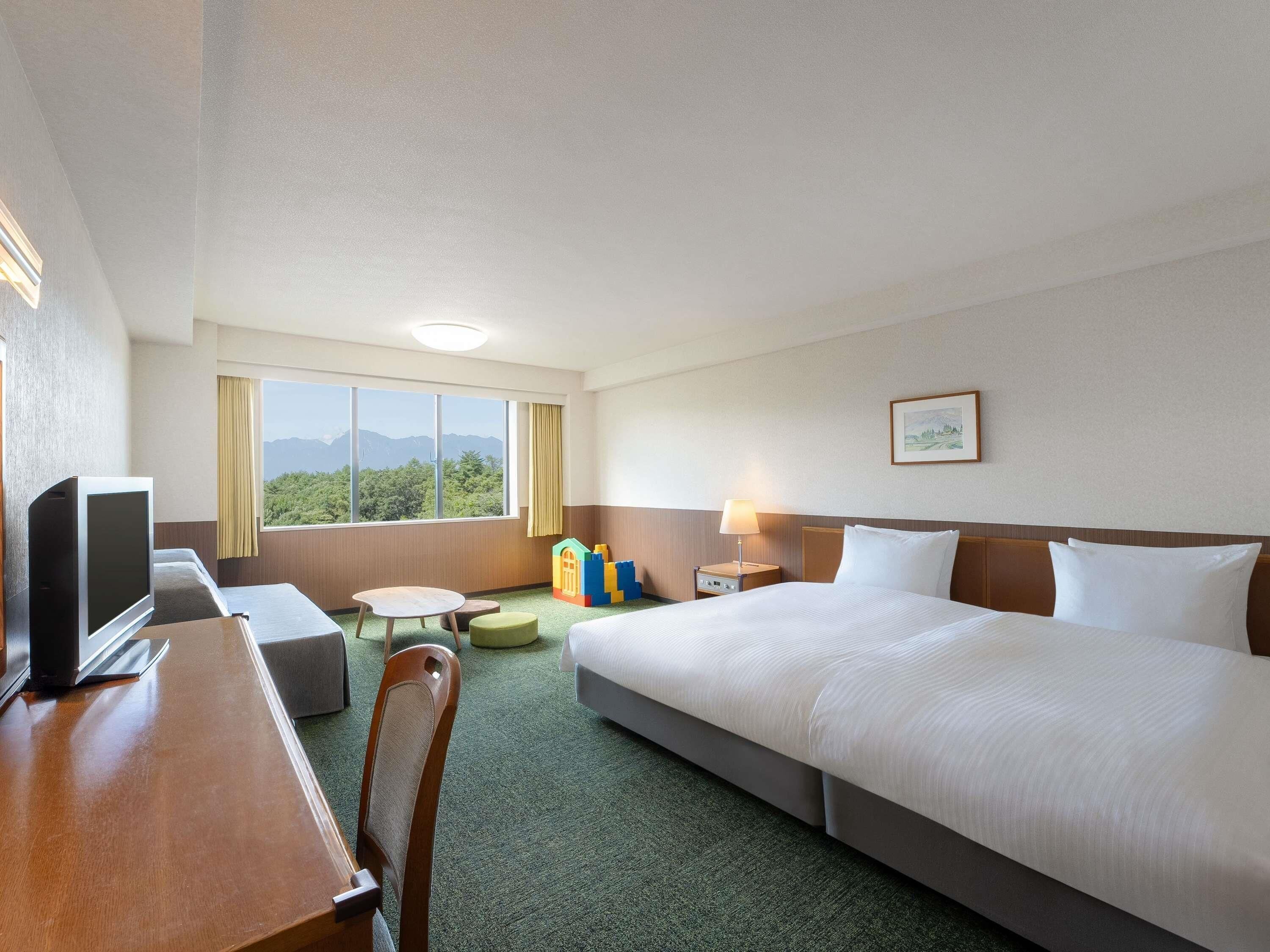 Premium bedding, down duvets, in-room safe, desk