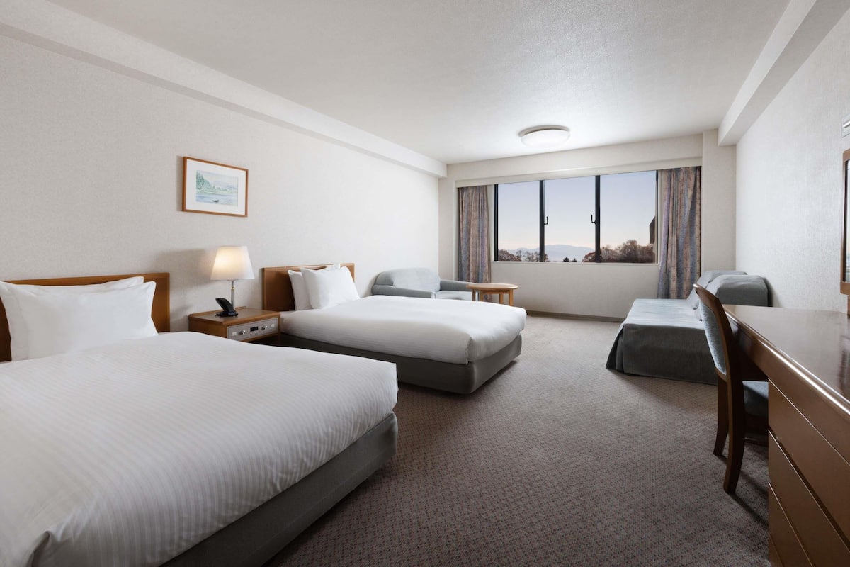Premium bedding, down duvets, in-room safe, desk