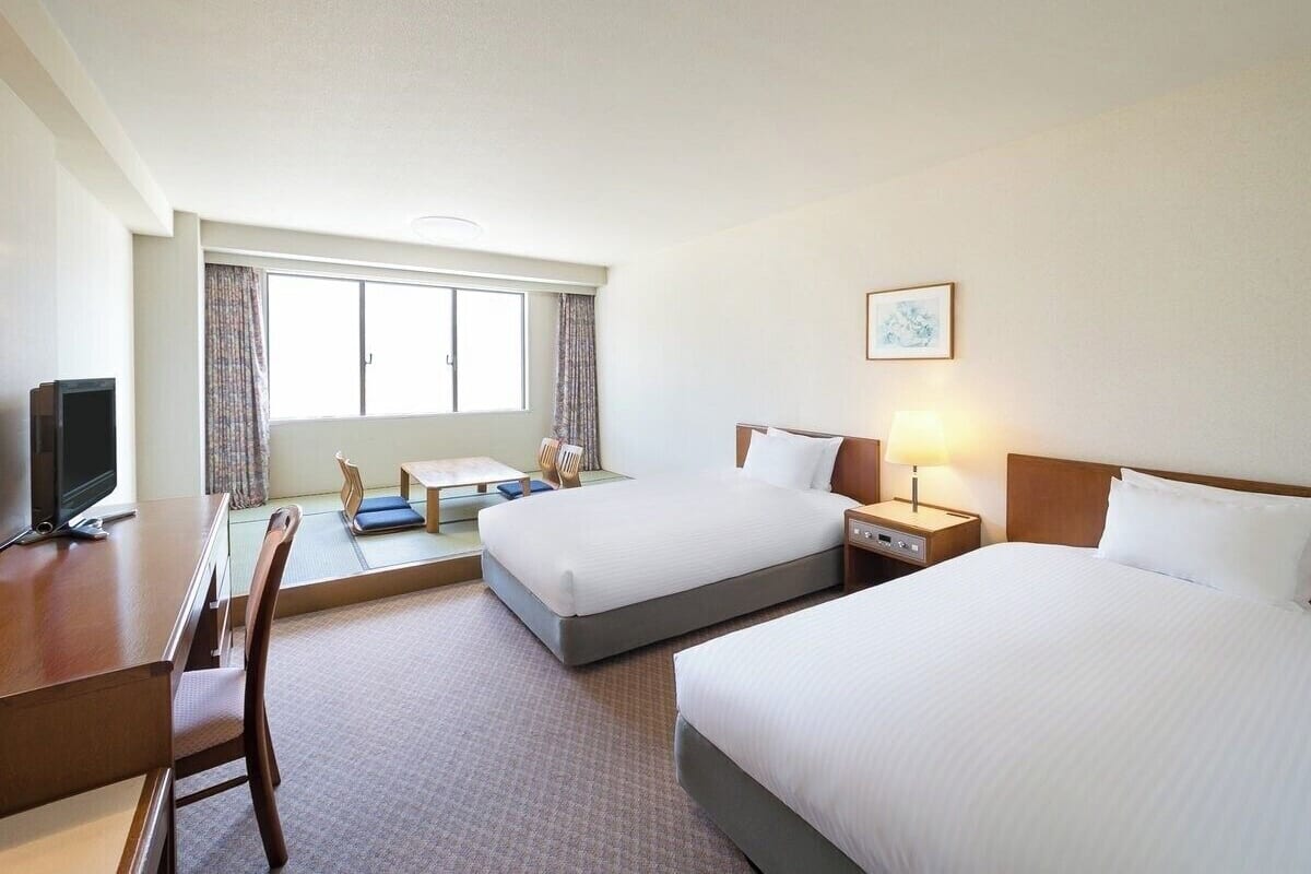 Premium bedding, down duvets, in-room safe, desk
