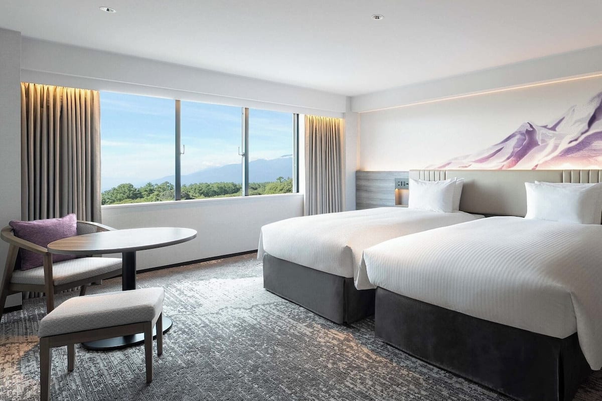 Executive Room (2 Twin Beds and 2 Extra Beds) | Premium bedding, down comforters, in-room safe, desk