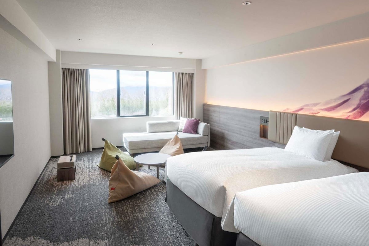 Premium bedding, down comforters, in-room safe, desk