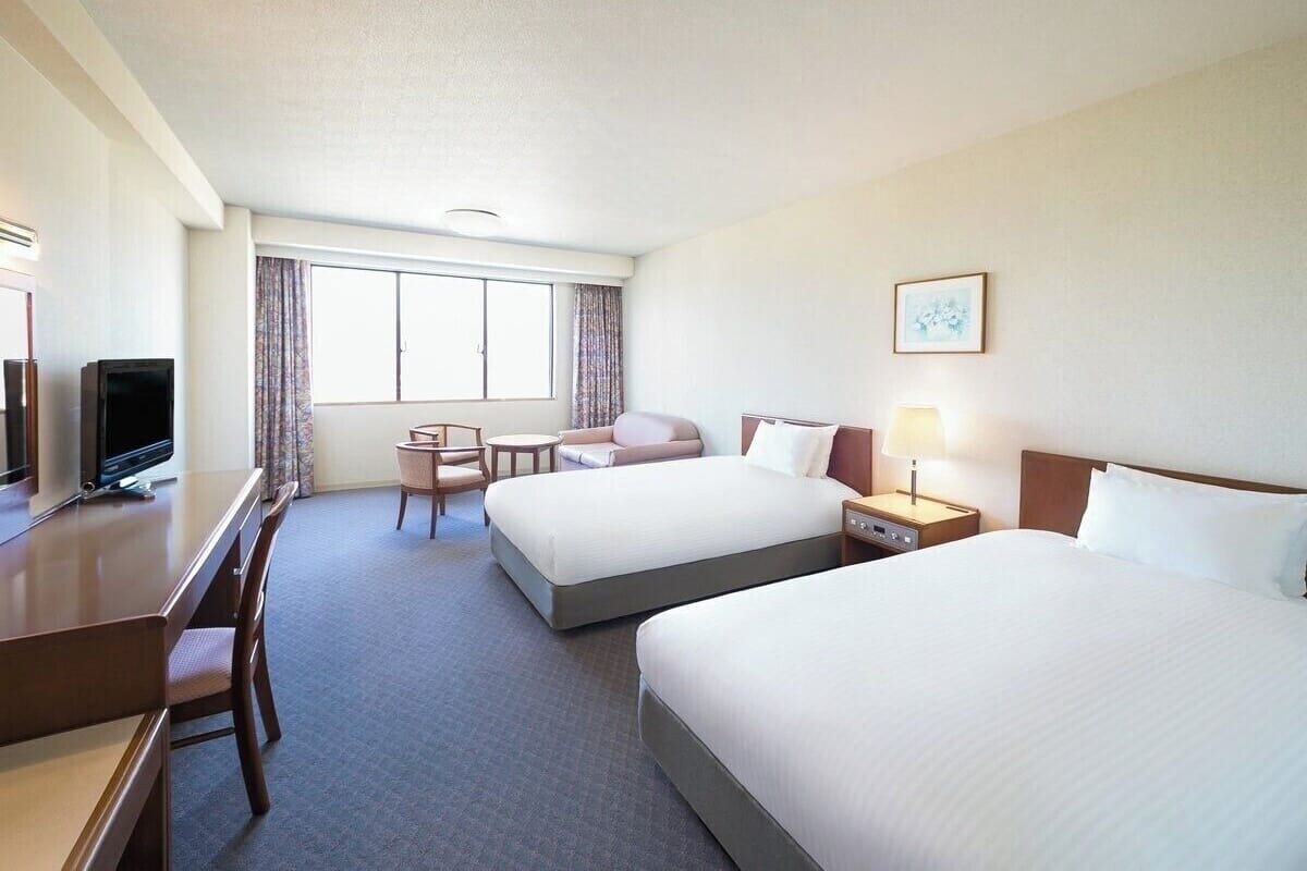 Premium bedding, down duvets, in-room safe, desk