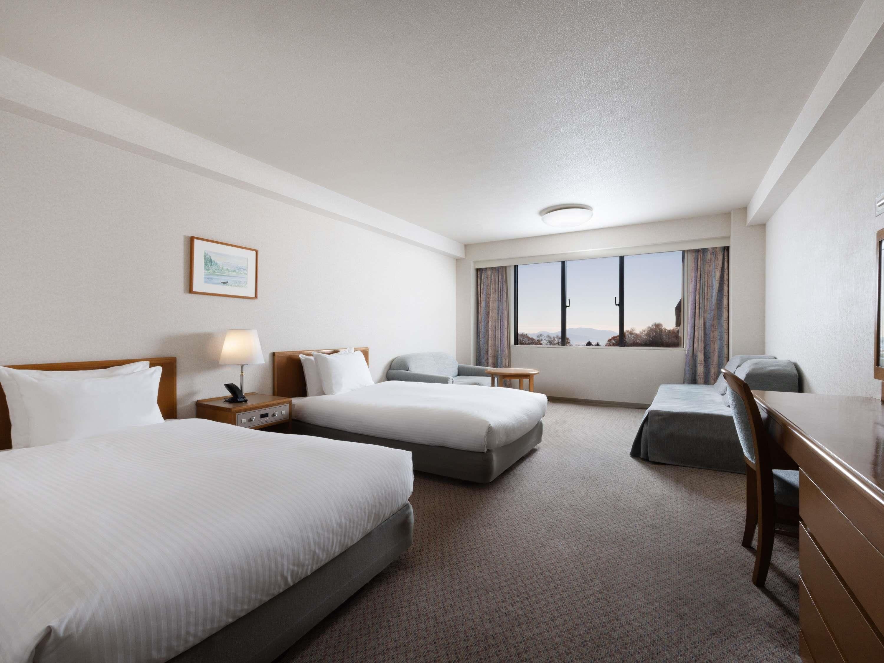 Premium bedding, down comforters, in-room safe, desk