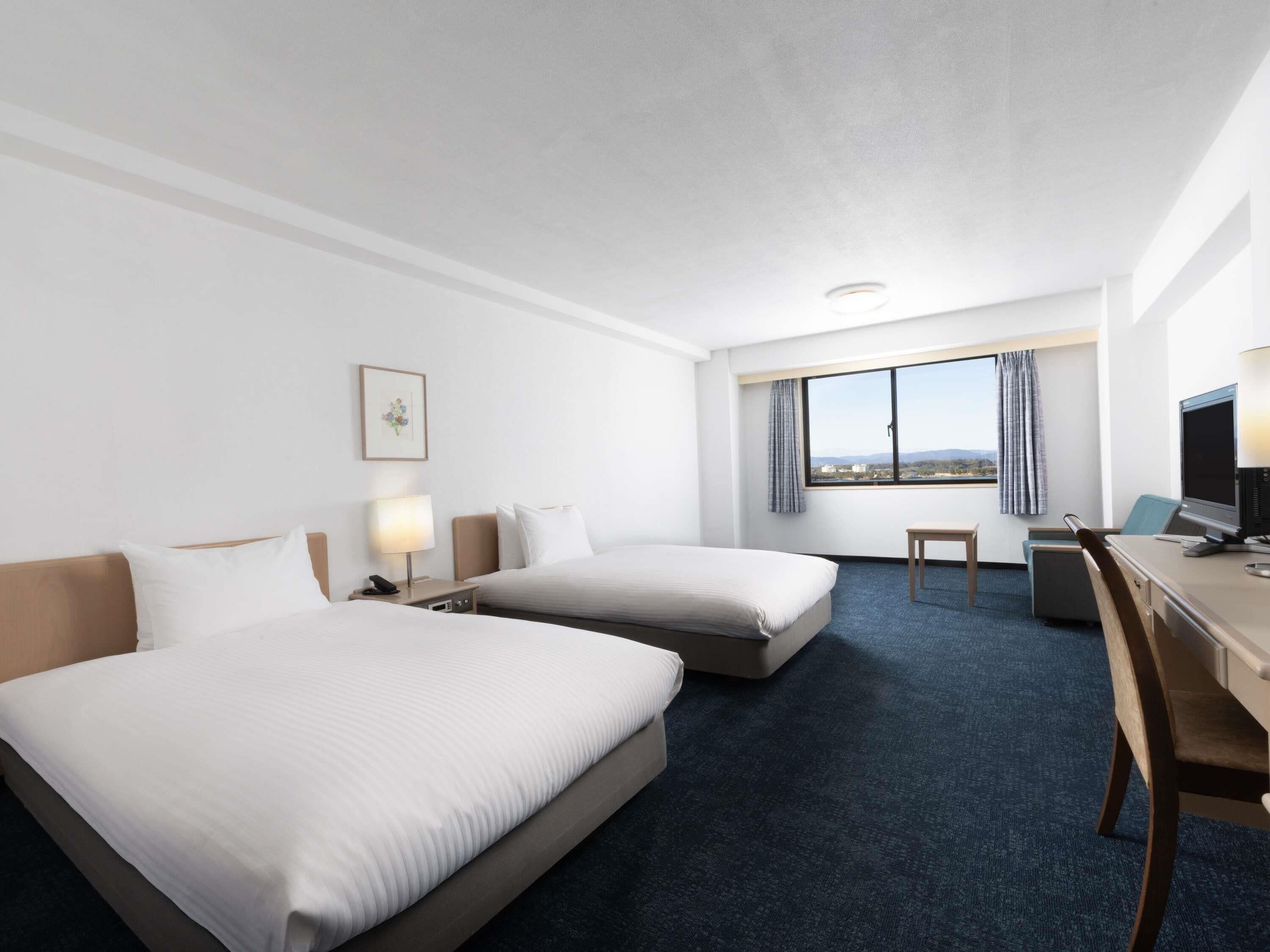 Classic Room with 2 single beds and 2 extra beds | In-room safe, iron/ironing board, free WiFi, bed sheets