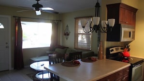 Classic Cottage, 1 Bedroom, Non Smoking | Living area - Sunset Beach Cottages (Treasure Island)